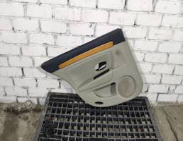 Обшивка двери задней левой для Renault Laguna III 2007-2012  запчасти бу